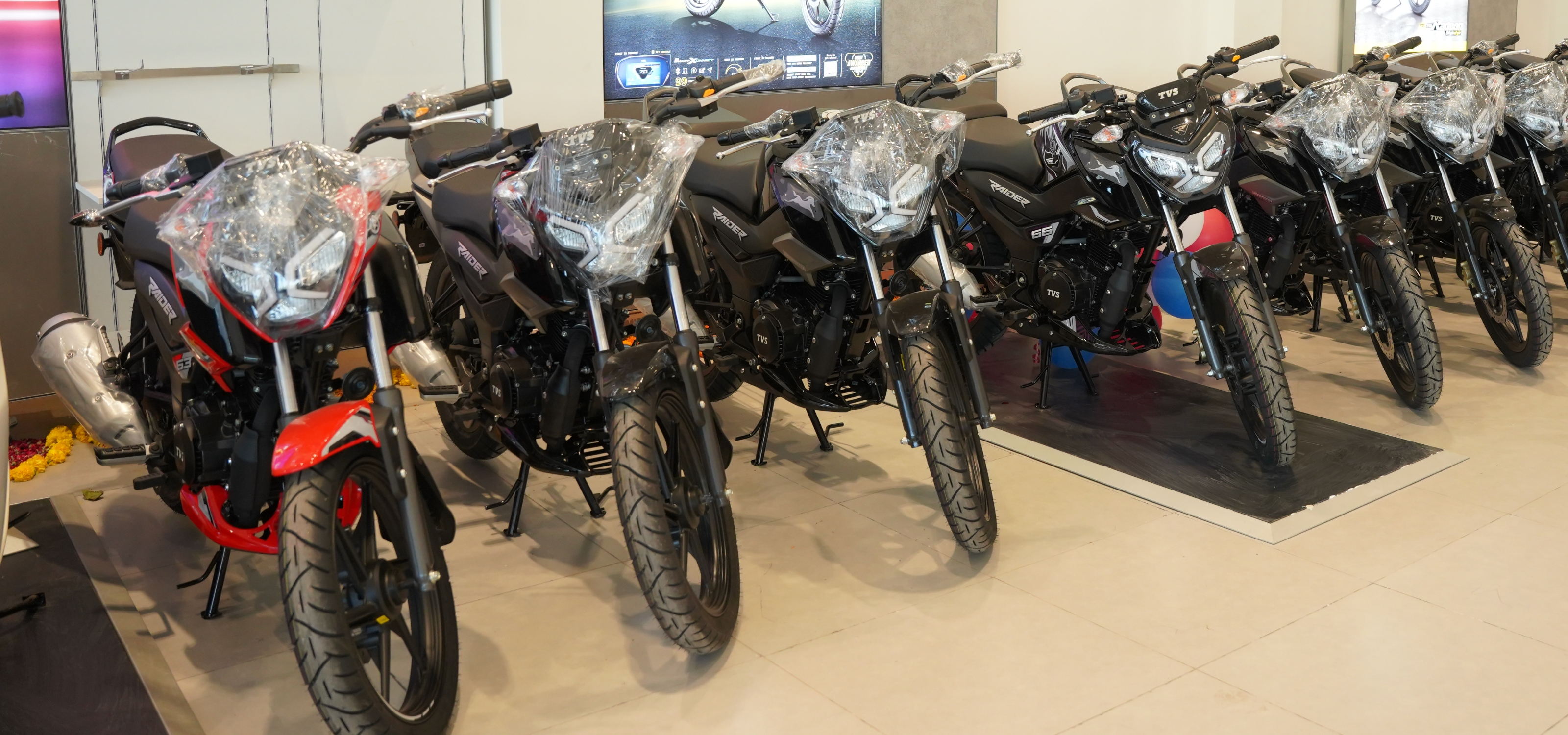 TVS Singhai Motocorp Vehicle Collection - Premium Motorcycles in Showroom